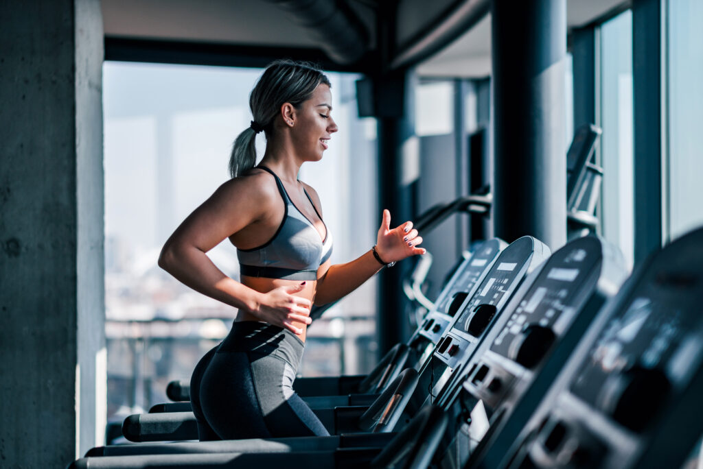 A woman working out on a treadmill